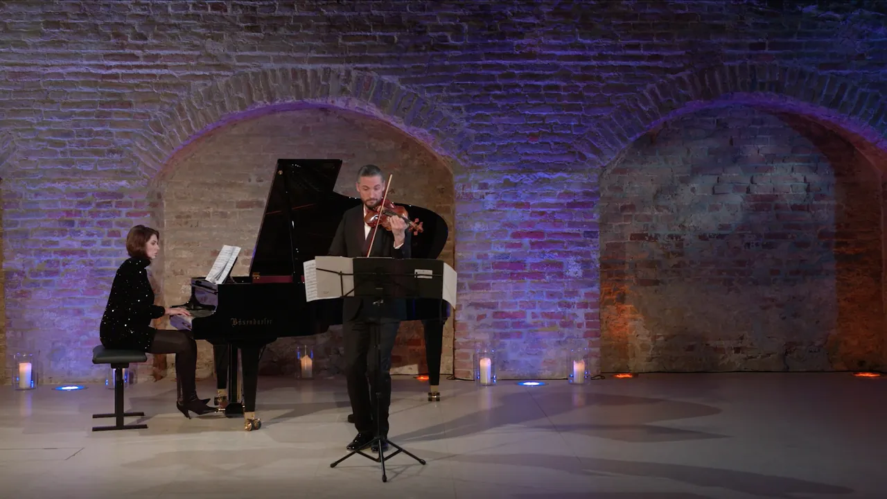 Johannes Fleischmann on violin and Magda Amara at the piano beneath the brick vaults of the Palais Coburg casemates